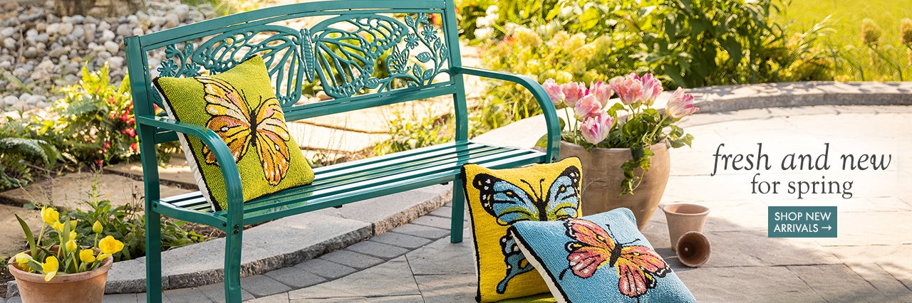Lifestyle Image of Butterfly Bench with Butterfly Pillows in backyard. fresh and new for spring.  SHOP NEW ARRIVALS