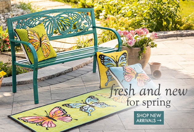 Lifestyle Image of Butterfly Bench with Butterfly Pillows in backyard. fresh and new for spring.  SHOP NEW ARRIVALS