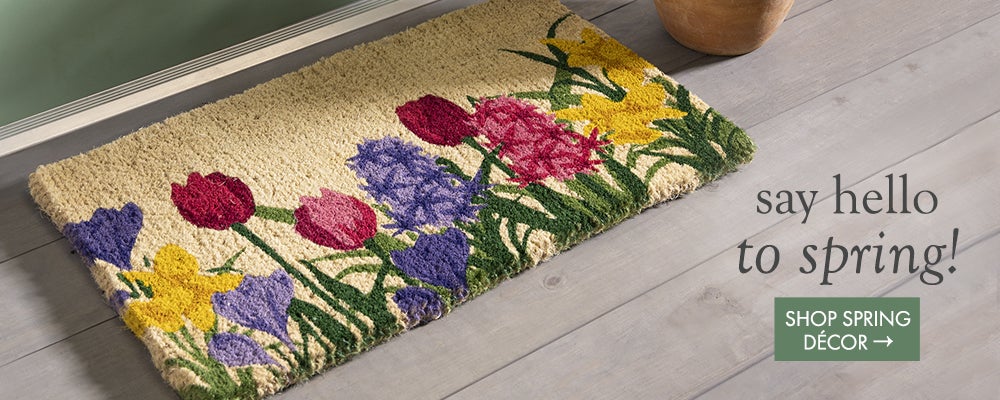 Image of Spring Blooms Coir Mat in front of door. say hello to spring. SHOP SPRING DECOR