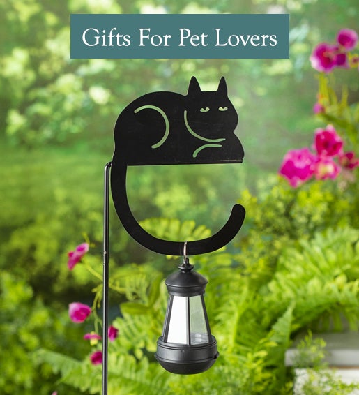A garden stake of a cat silhouette with a solar lantern. Shop gifts for Pet Lovers.