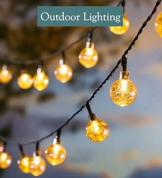 Image of Multi-Function Solar Ball String Lights With Warm White LEDs lit up. OUTDOOR LIGHTING