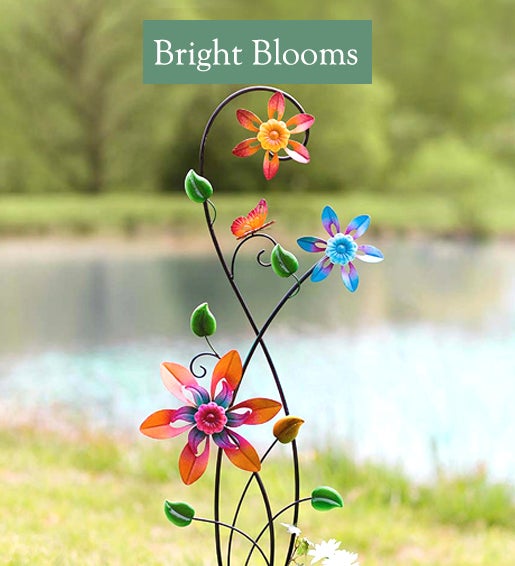 Image of Colorful Spinning Flowers Garden Stake and Wind Spinner. Bright Blooms